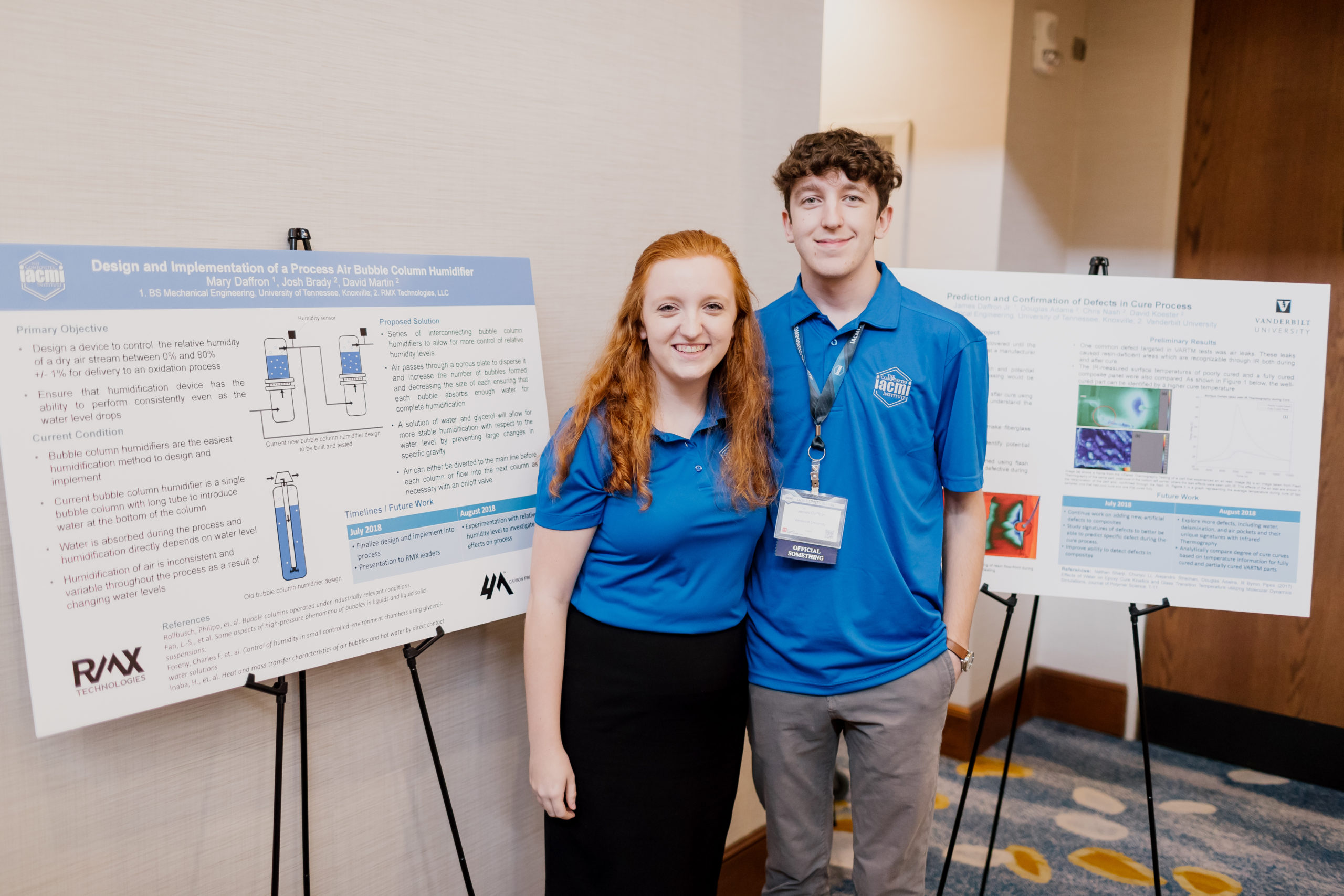 Young man and woman standing together in front of presentations